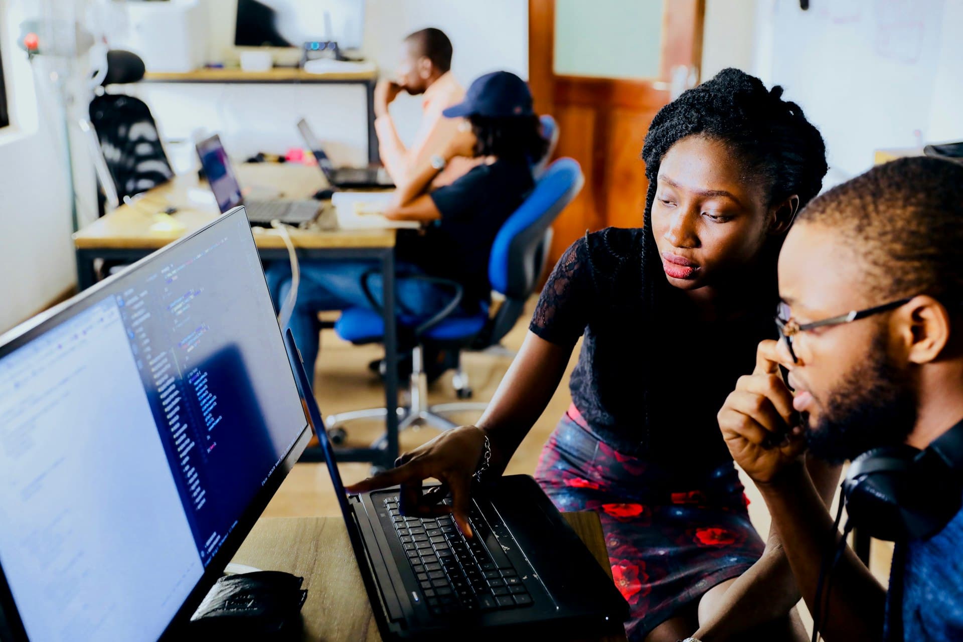 Entrepreneur working with AI tools at their desk